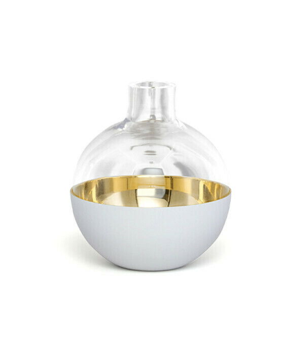 Liten, rund vase i klart glass med lav sokkel i polert messing